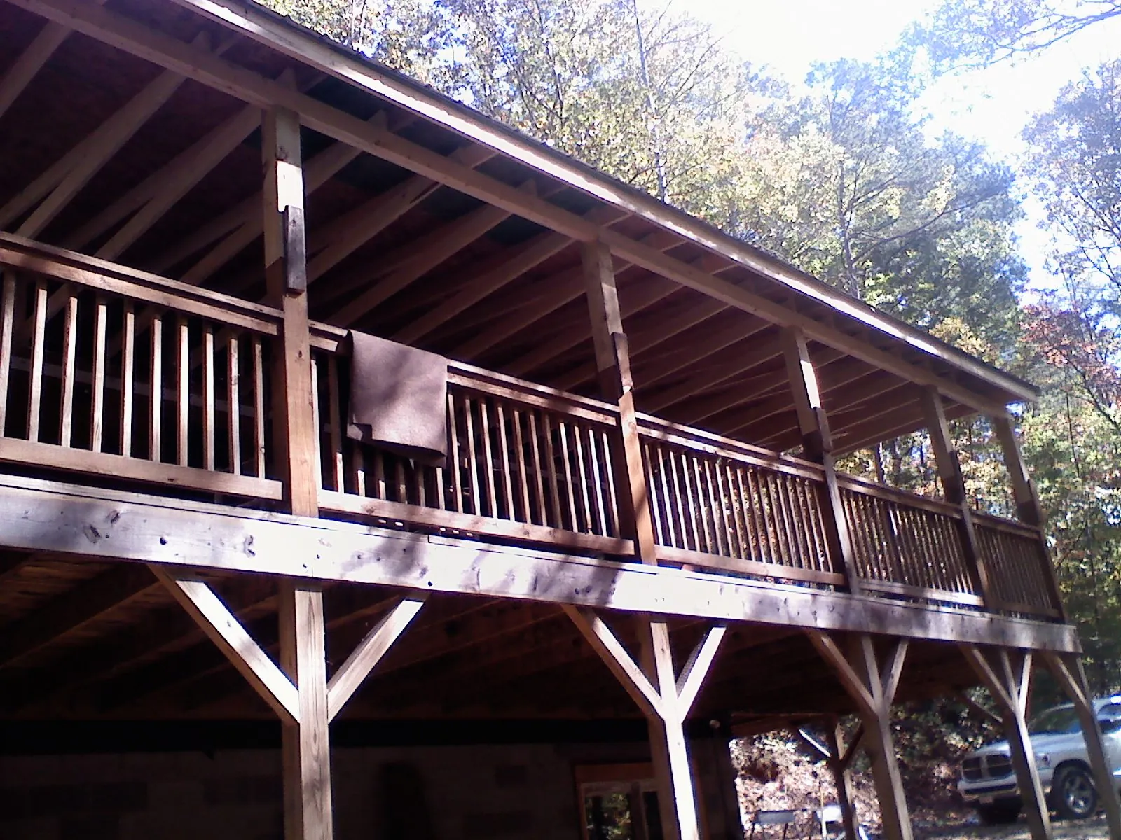 Timber framing under a new elevated porch and deck in Fairhaven